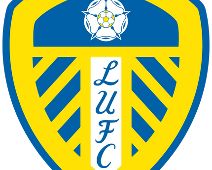 Il crest ufficiale del leeds united con scudo a strisce gialle e blu rosa bianca e pallone al centro in collezione leeds united
