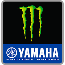 Logo verde monster su emblema yamaha factory racing nero e blu in collezione monster energy yamaha