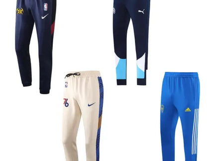 Quattro paia di pantaloni di tuta nba in navy crema e blu con loghi dei brand ideali per lallenamento
