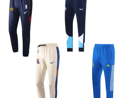 Quattro paia di pantaloni di tuta nba in navy crema e blu con loghi dei brand ideali per lallenamento