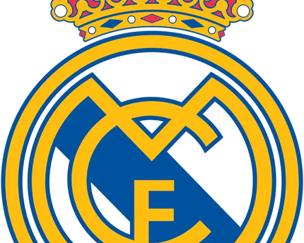 L’emblema ufficiale del real madrid con corona dorata su cerchio blu bianco e scritta gialla in grassetto.