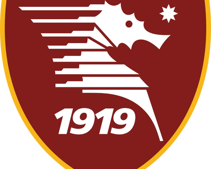 L’emblema salernitana mostra un cavallo bianco stilizzato su uno scudo granata con bordo dorato e anno 1919