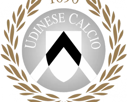 L’emblema di udinese calcio con uno scudo circolare argento, chevron bianco e nero e corona d’alloro oro 1896