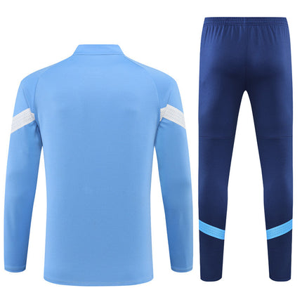 Kit Giacca Blu + Tuta Manchester City 2022/23 (con Taglia Bambino)