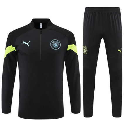 Kit Giacca Nera + Tuta Manchester City 2022/23 (con Taglia Bambino)