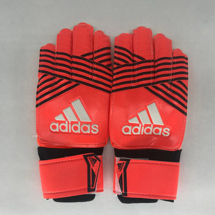 Guantoni da calcio adidas replica arancioni e neri con finitura lucida e design a strisce bold sul retro
