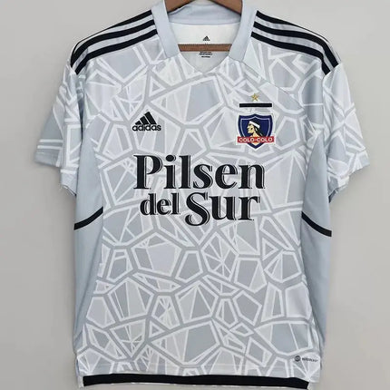 Maglia 3 portiere colo-colo 2022/23 adidas a manica lunga grigio chiaro e bianco con motivo geometrico e stemma club