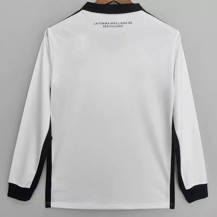 Maglia bianca maniche lunghe colo colo home 2022 23 con rifiniture nere su colletto maniche e lati