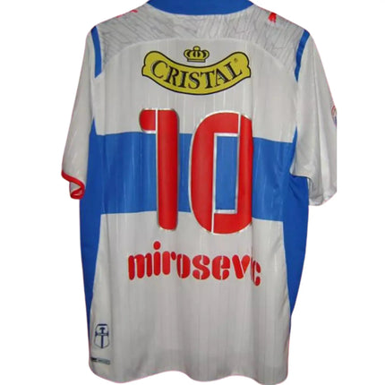 Maglia bianca retro universidad catolica home 2009 10 con righe blu numero 10 rosso mirosevc e logo cristall giallo sul retro