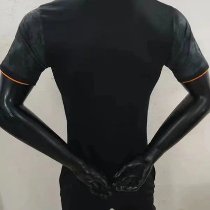 Maglia mls houston dynamo fc trasferta 2022 23 maglia atletica nera con motivo mimetico sulle spalle e rifiniture arancioni alle maniche