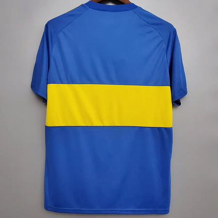 Maglia retro boca juniors home 1981/82 con corpo blu solido e maniche corte a righe blu e gialle in stile raglan