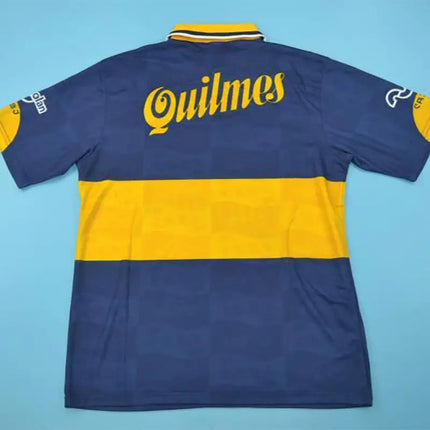 Retro maglia boca juniors home 1995 96 vista posteriore blu gialla con banda orizzontale e logo quilmes oro