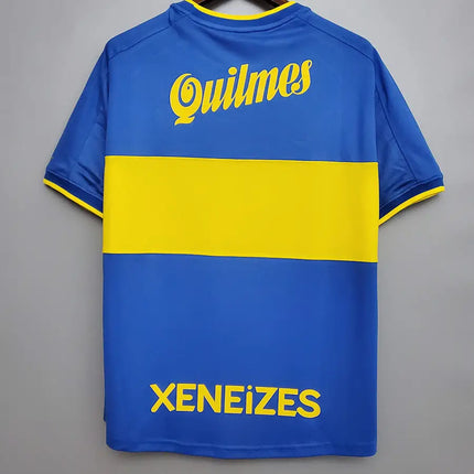 Maglia retro boca juniors home 1999 2000 blu e gialla con righe orizzontali e scritte quilmes e xeneizes