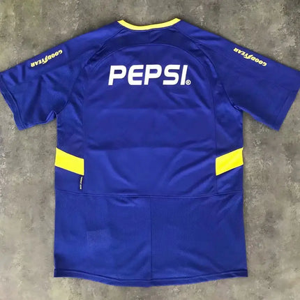 Retro maglia boca juniors home 2003/04 vista posteriore blu reale con logo pepsi bianco e rifiniture giallo brillante