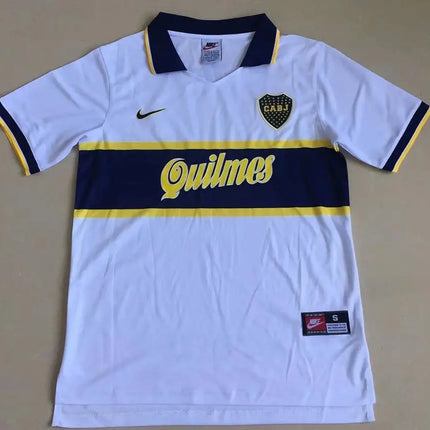 Maglia retro boca juniors trasferta 1996 97 bianca con dettagli blu navy e gialli logo quilmes e nike chest crest