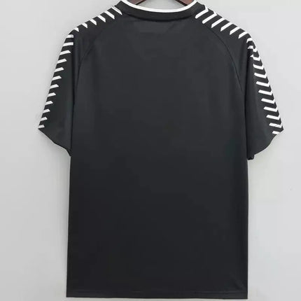 Maglia retro colo-colo trasferta 1991 92 nera con strisce diagonali bianche sulle maniche in tessuto tecnico atletico