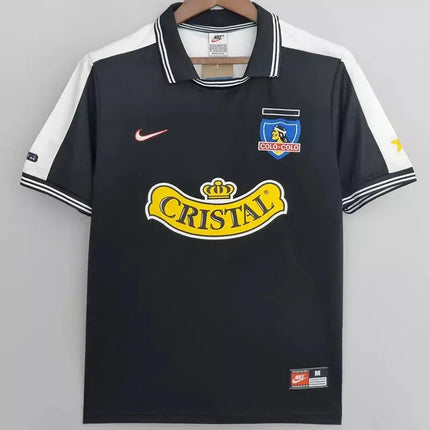 Maglia retro Colo-Colo trasferta 1999 00 nero con maniche bianche e logo cristallo giallo sul petto