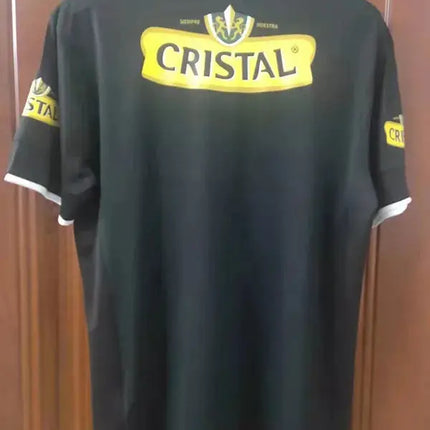 Maglia retro colo-colo trasferta 2013/14 nero con logo cristallino giallo e testo colo colo 2013 sul colletto