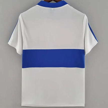 Maglia retro universidad catolica home 1984 85 polo bianca con colletto blu reale e banda orizzontale sul petto