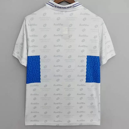 Maglia retro universidad catolica trasferta 1996 97 bianca lotto con pannelli geometrici blu e logo marchio ripetuto